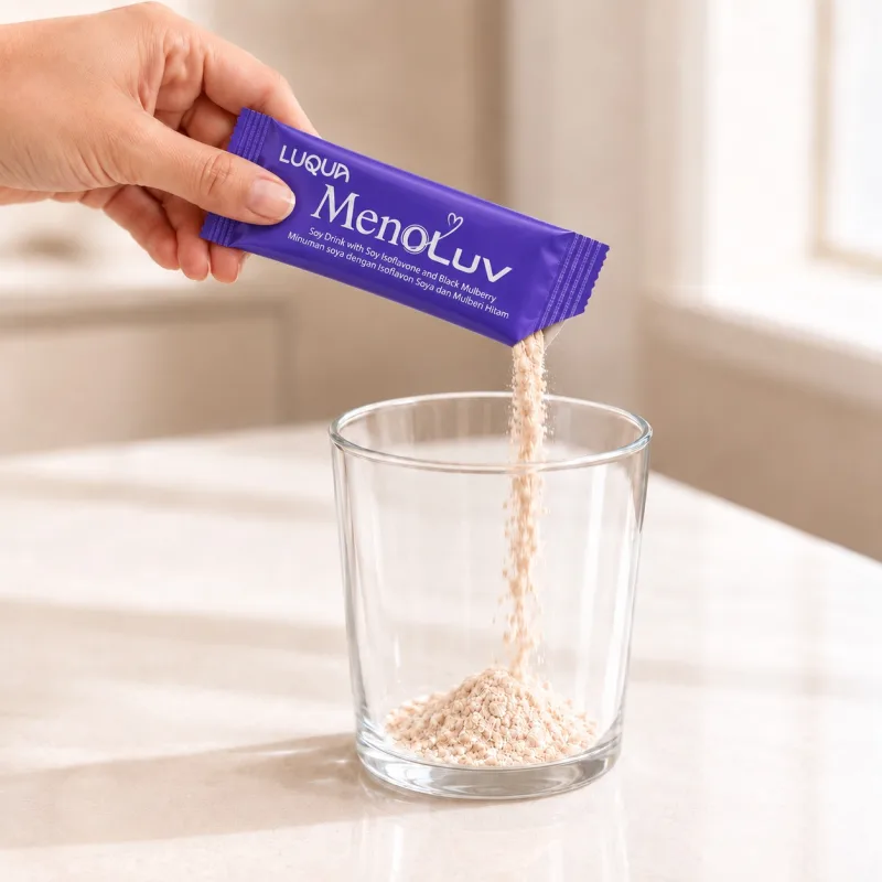 Emptying one MenoLuv sachet into a glass